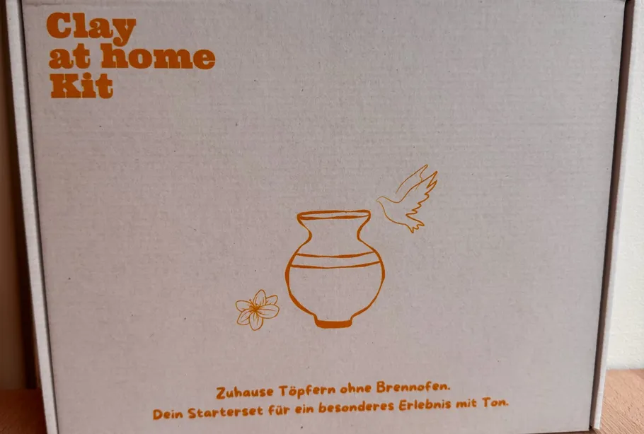 Clay kit box with illustration and text.