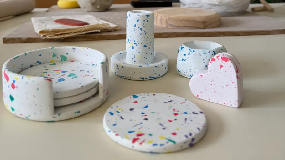 Colorful terrazzo decor items on a table.