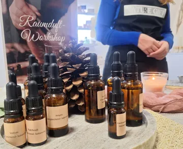 Aroma workshop with essential oils and candles.