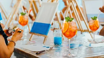 Cocktail and painting session at art class.