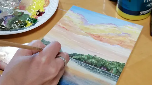 Hand painting landscape on small canvas.