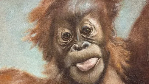 Orang-Utan macht ein verspieltes Gesicht auf Leinwand.