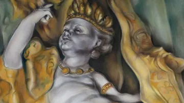 Statue of a cherub with a crown in drapery.