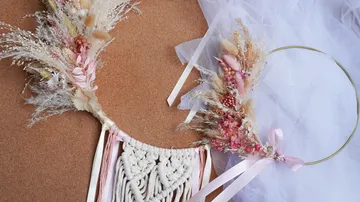 Boho floral decor on corkboard and fabric.