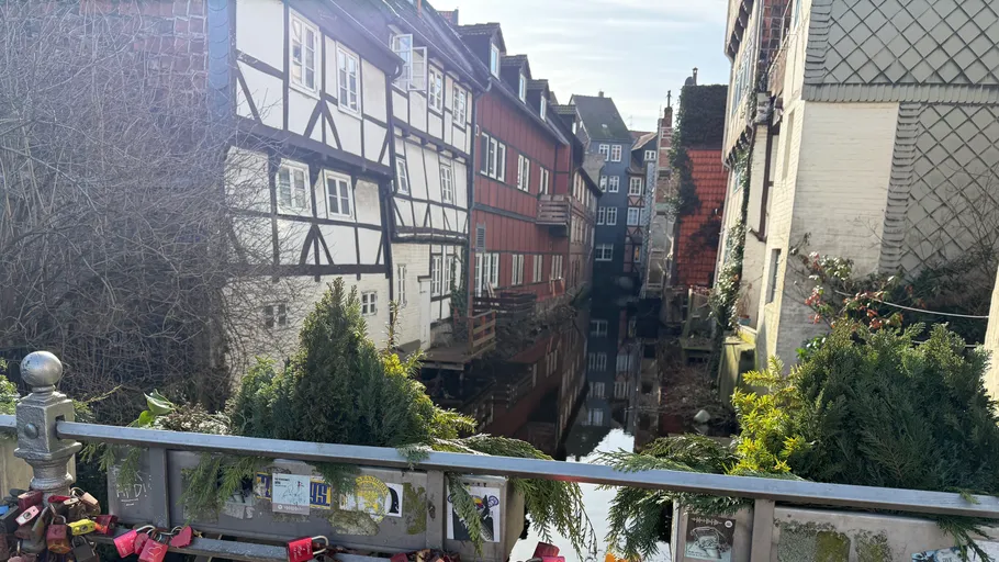 Half-timbered houses along a narrow canal.