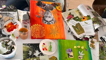 Collage art with flowers on a table.