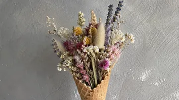 Dried flowers arranged in a waffle cone.