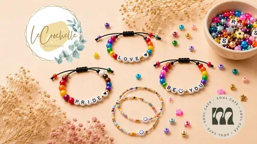 Colorful bracelets with beads on a beige background.