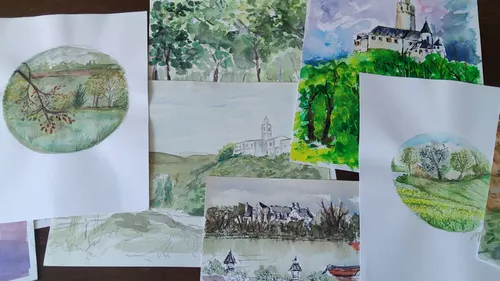 Verschiedene Aquarell-Landschaften und Gebäude auf Papier.