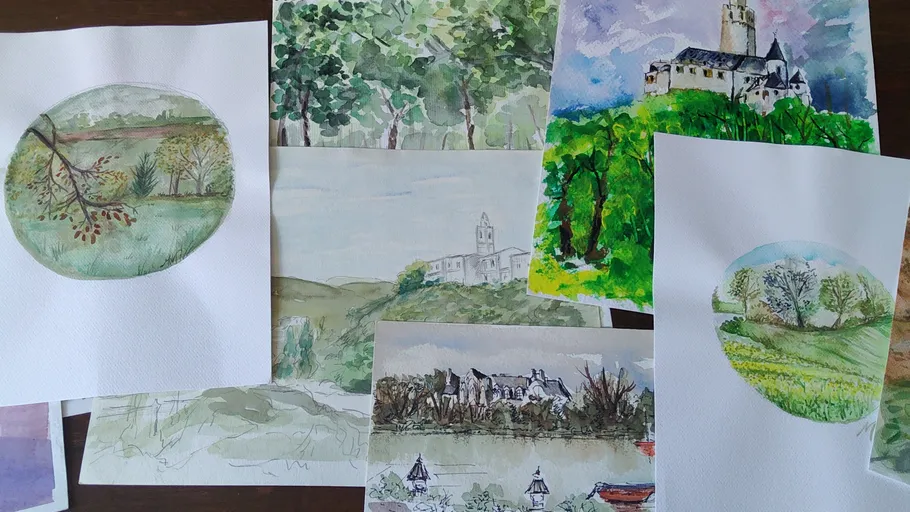 Verschiedene Aquarell-Landschaften und Gebäude auf Papier.