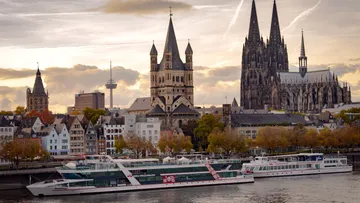 Boats on river with Cologne Cathedral.