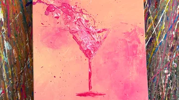 Abstract pink drink splashing on canvas.