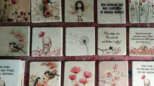 Tiles with illustrations and German text.