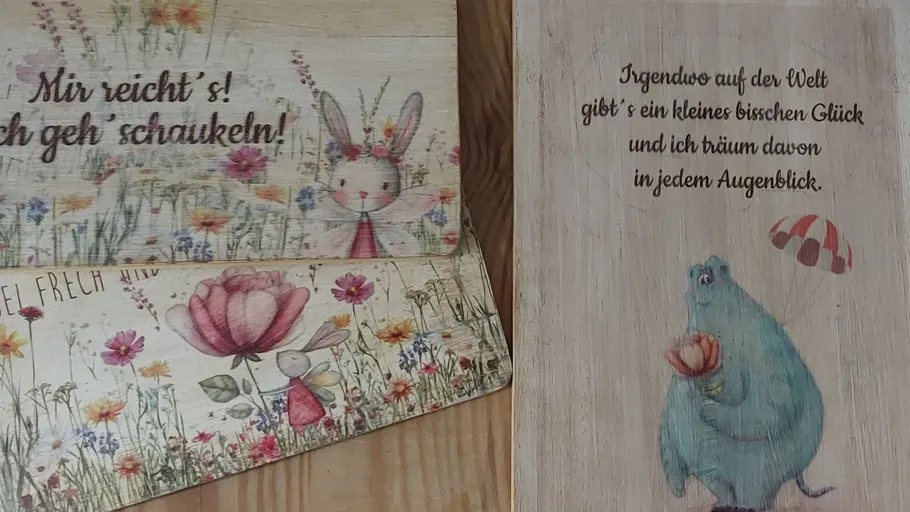 Decorative signs with whimsical illustrations.