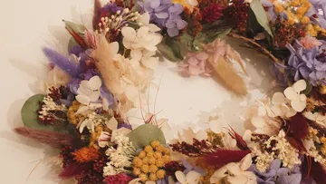 Floral wreath with mixed dried flowers.