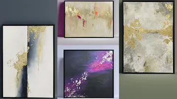 Abstract paintings with gold leaf accents displayed.