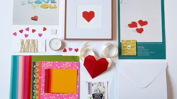 Craft supplies for Valentine's Day cards.