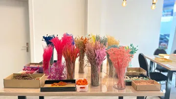 Colorful dried flowers displayed on a table.