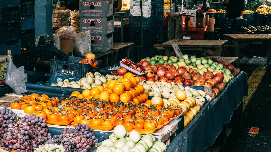 Fruit stand displaying a variety of fruits.