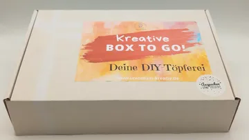 Cardboard box with creative DIY label.