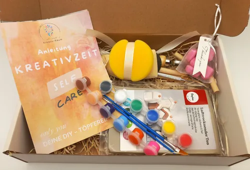 DIY craft kit with paints in box.