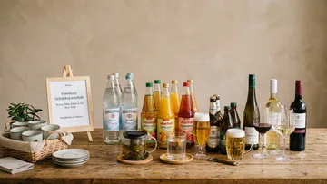 Beverages on a wooden table display.