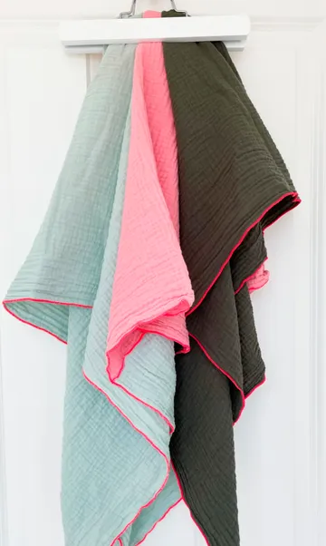 Fabric on hanger in light, pastel colors.