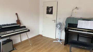Musical instruments in a practice room.