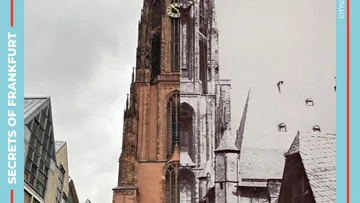 Half old, half new cathedral tower.