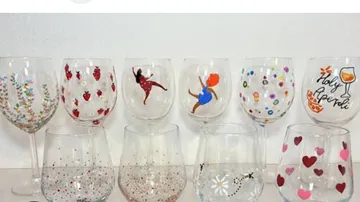 Decorative wine glasses on a white surface.