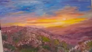 Sonnenuntergang über hügeliger Landschaft gemalt.