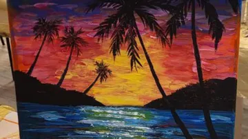 Painting of palm trees at sunset over water.