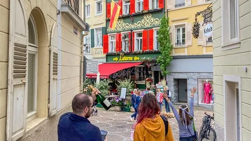 People walking in a vibrant European street.