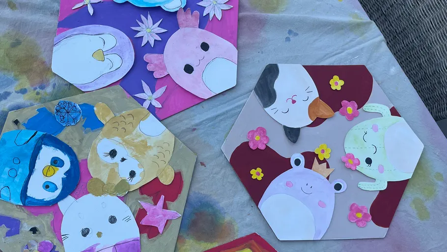 Tier-Papierbasteleien auf bunten Hintergründen.
