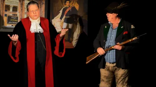 Two men in costumes, theatrical performance.