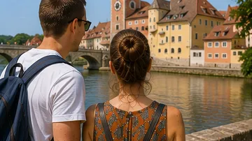 Couple views riverside historical buildings.