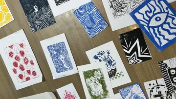 Abstract prints on wooden floor.
