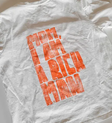 White shirt with bold red text.