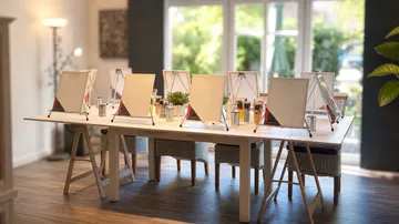 Easels set up in art studio classroom.