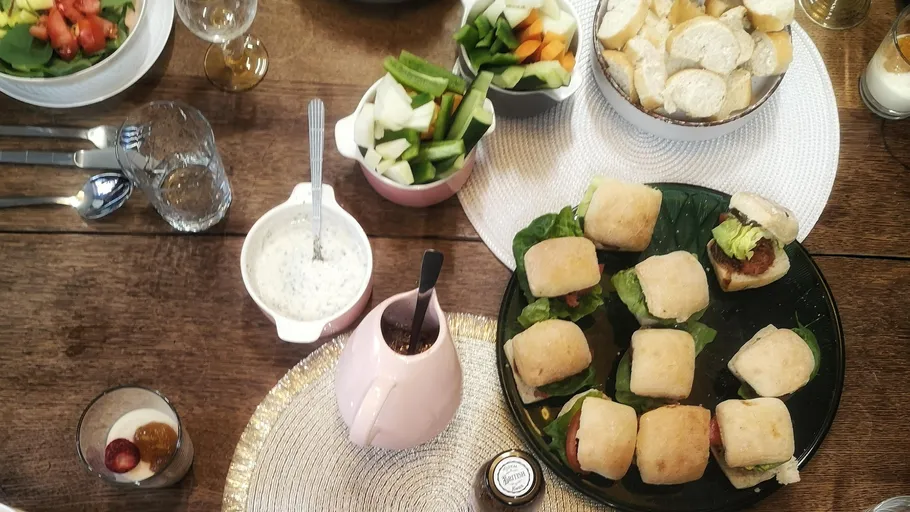 Assorted appetizers on a wooden table.