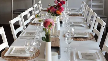 Elegant dining table with floral decorations.
