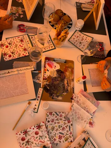Craft supplies on table with snacks.