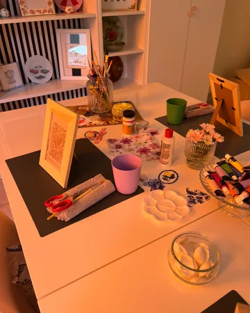 Art supplies on table in craft room.
