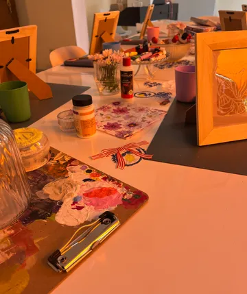 Craft supplies arranged on a table.