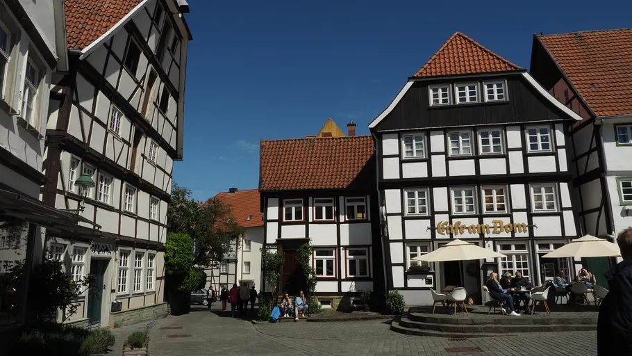 Half-timbered houses with outdoor cafe.