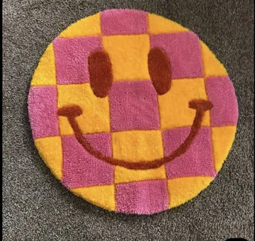 Circular rug with smiley face design.