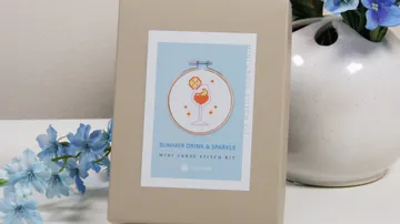 Stitch kit box with floral decor.
