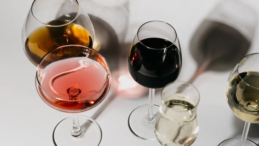 Various wine glasses casting shadows.