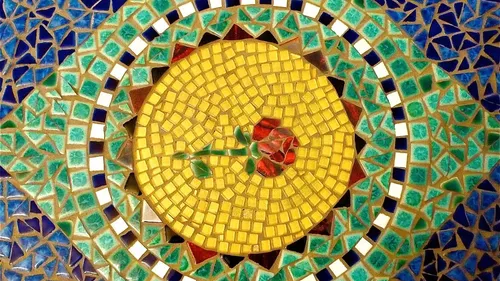 Rose mosaic pattern with geometric tiles.