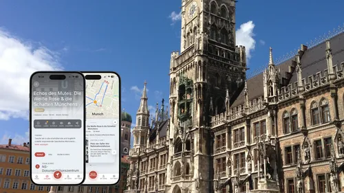 Smartphones mit App, Münchner Rathaus im Hintergrund.